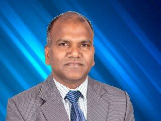 Portrait of Australia Awards alumnus Dr Nepali Sah