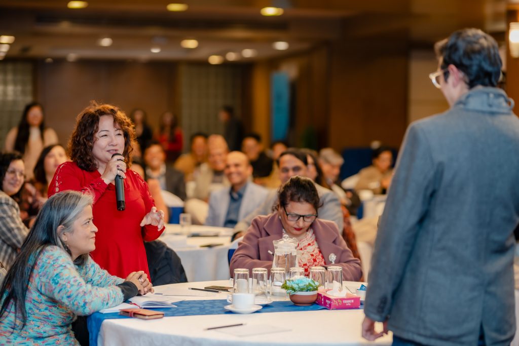 Alum Seema Rai asking a question from Mr