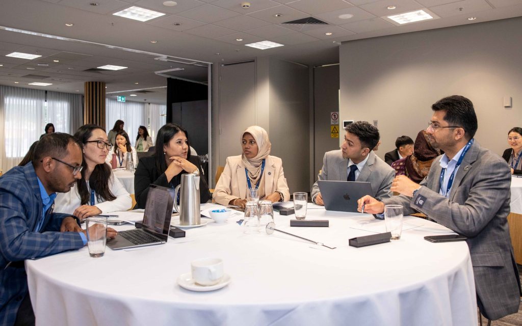 Lokendra (second from right) participating in the 2024 Scholars Forum in Canberra.