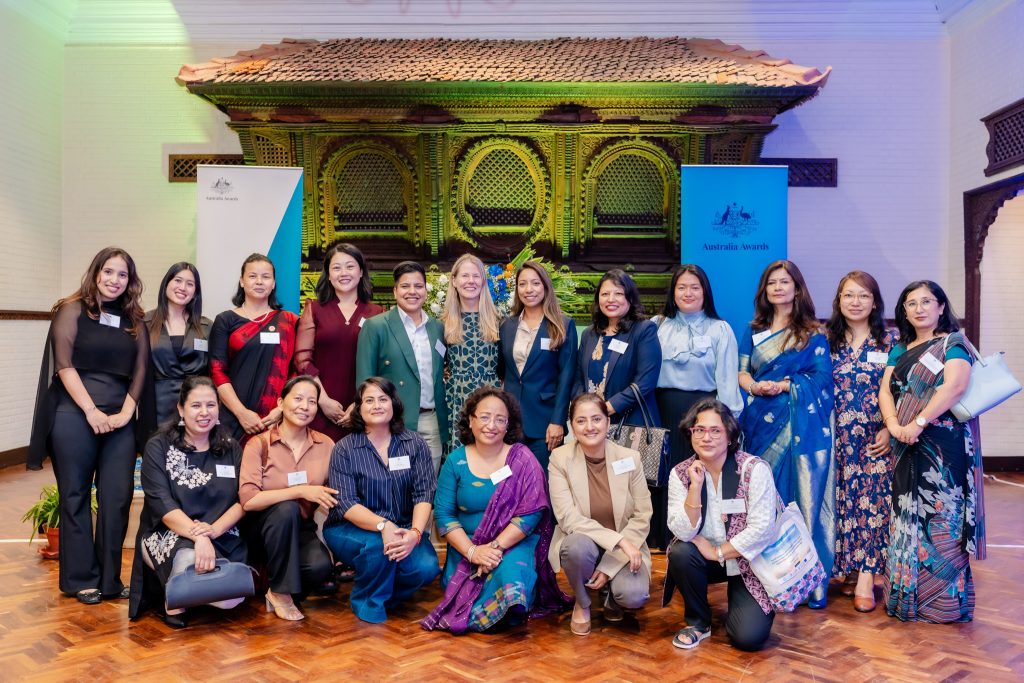 First Assistant Secretary Sarah Storey (back row, middle) with alumni who have studied in Australia.