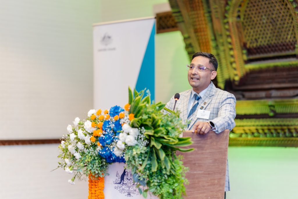 ANAA President Sudarshan Neupane speaking at the event.
